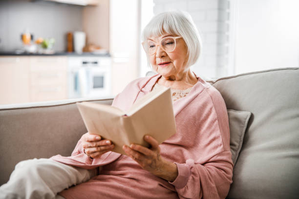 Elderly Woman Reading Book